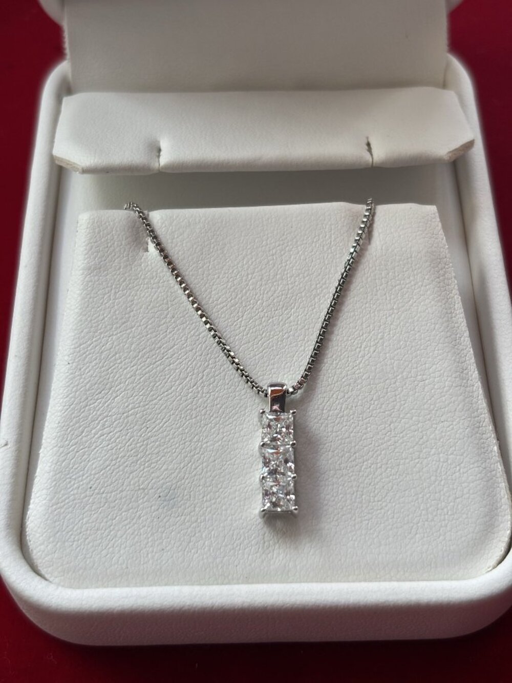 Princess-cut CZ three stone Sterling silver Pendant and box chain.